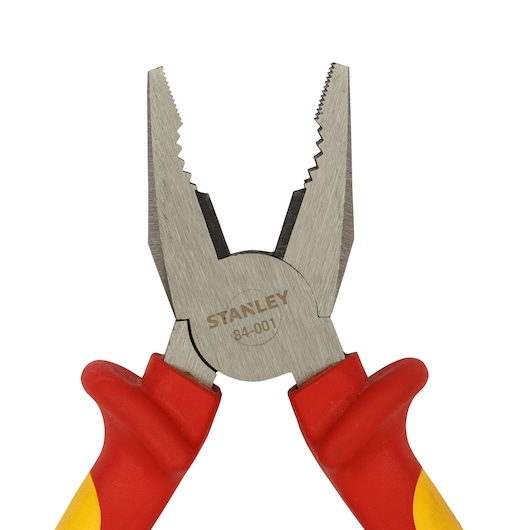 STANLEY 0-84-001 combination pliers with red and yellow insulated handles, front angle, on white background.