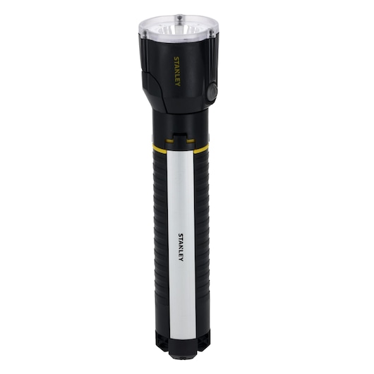 A STANLEY branded black and silver flashlight with a cylindrical body and a clear lens at the top, shown standing upright against a white background.