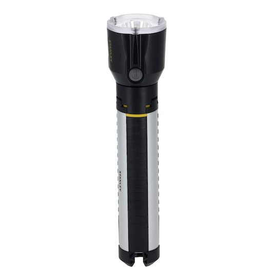 A STANLEY-branded flashlight with a black and silver body, featuring a yellow accent and a central power button, shown standing upright against a white background.