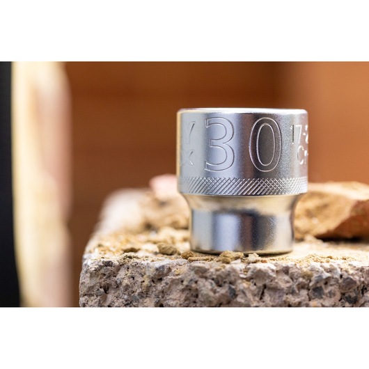 STANLEY FMMT17238-0 socket, silver finish, close-up on stone surface, photography product.