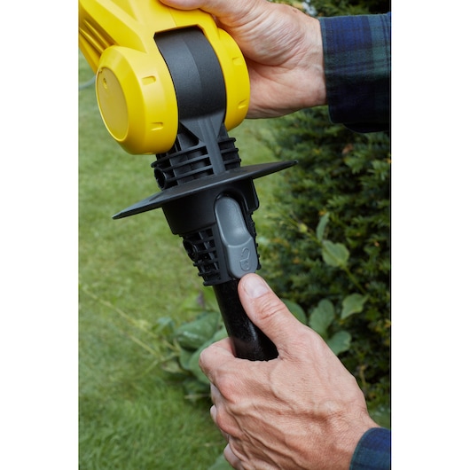 STANLEY SFMCPH845M1 garden tool close-up showing handle and adjustment mechanism outdoors.