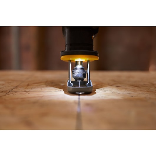 STANLEY SFMCS305B compact router photography, close-up view on wood surface.