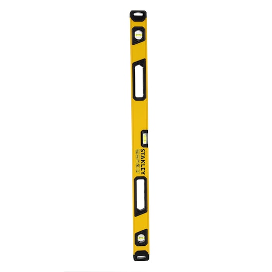 A yellow Stanley spirit level with three bubble vials and two handles, shown vertically against a white background.