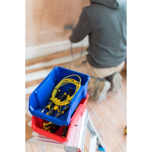 STANLEY STST82743-1 storage bins with hand tools and cable, photography of bins stacked on ladder.