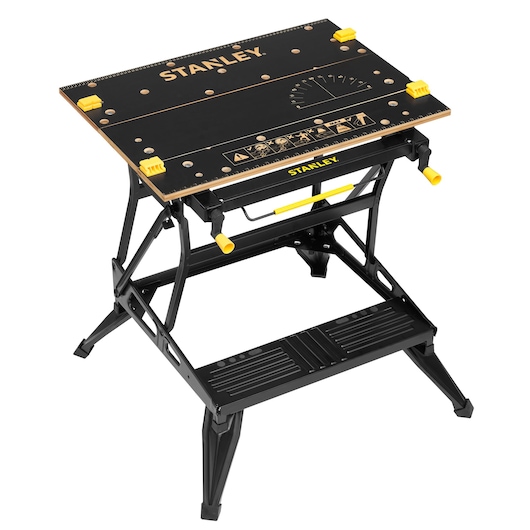 STANLEY STST83800-1 black and yellow workbench with foldable legs, top angle, on white background.