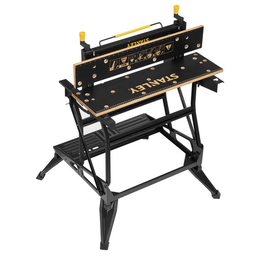 STANLEY STST83800-1 folding workbench with black and yellow accents, photographed at an angle on white background.